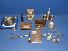 A quantity of plated items include a boxed Cunard Princess pin tray, bear money box, cigarette case,