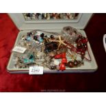 A quantity of costume jewellery to include; brooches, earrings, bracelets, necklaces, etc.