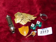 A small quantity of mixed jewellery including a plastic deco lady brooch, cat ring,