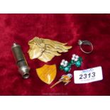 A small quantity of mixed jewellery including a plastic deco lady brooch, cat ring,