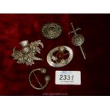 Five silver Celtic brooches; thistle, sword, etc.