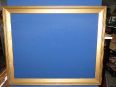 A large gilt coloured picture Frame, unglazed frame size 42" x 34", aperture size 36" x 29¾".