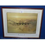 A framed and mounted print titled 'Outbound Lancaster' by Gerald Coulson 21" x 17".