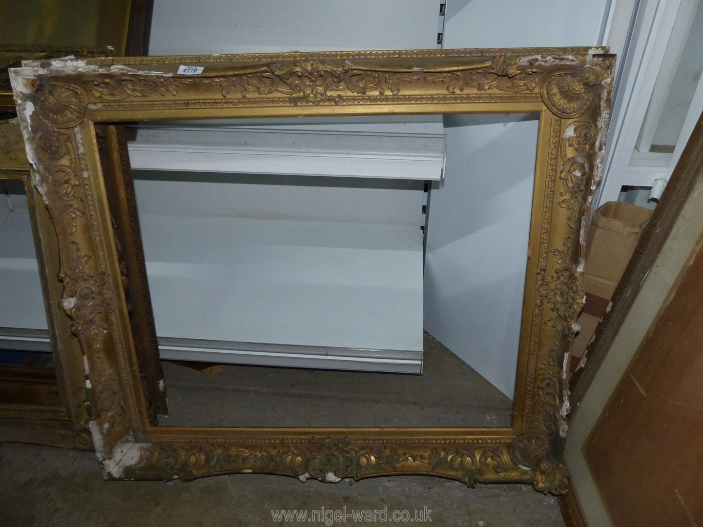 A large picture Frame, with loss to plaster decoration, 37½" x 32", aperture size 30¼" x 25½".