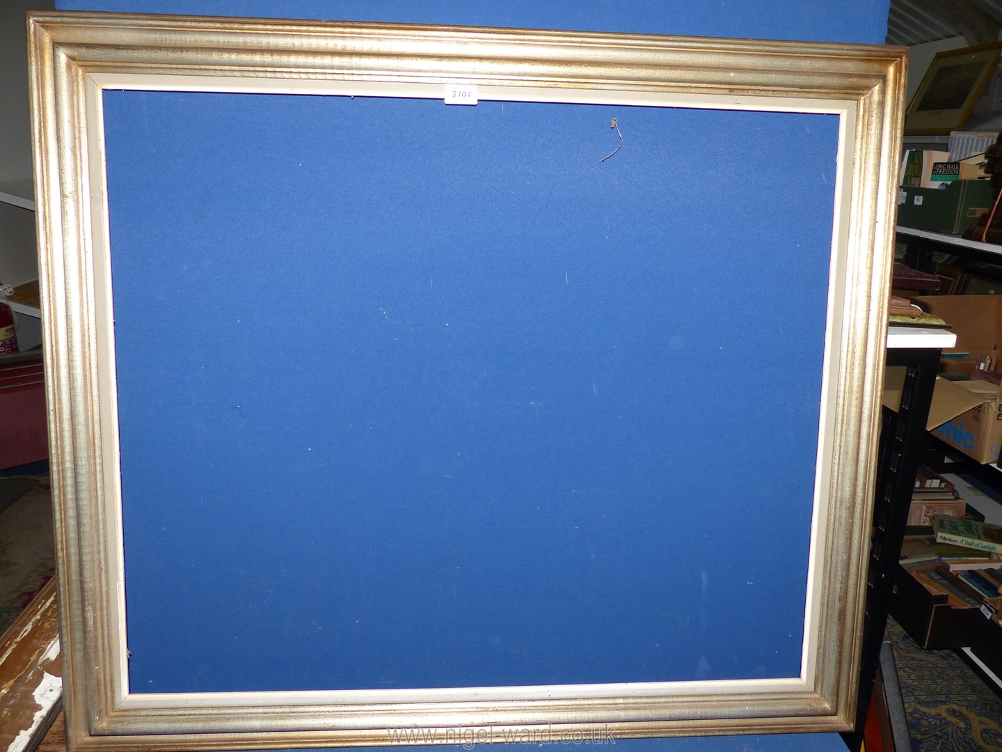 An unglazed wooden picture Frame sprayed in silver and gold, frame size 41½" x 34¾",