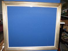 An unglazed wooden picture Frame sprayed in silver and gold, frame size 41½" x 34¾",