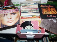 A quantity of 45 rpm records to include; Duran Duran, Sparks, The walker Brothers etc.