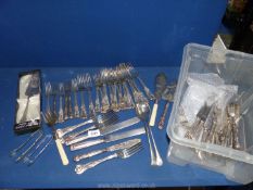 A large quantity of plated kings pattern cutlery including dinner forks, fish knives and forks,