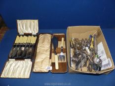 A quantity of epns and other plated cutlery including a boxed set of fish knives, carving set,