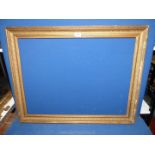 A picture Frame, with some loss to decoration, frame size 33" x 26¼", aperture 29¼" x 22".