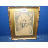 A small framed pencil sketch titled 'An Old Coaching Inn' initialed lower right L.D., 8¼" x 10¼".