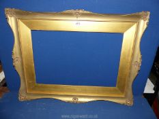 A gilt picture frame, (some damage to the plaster), 29½" x 22½" frame aperture size 21¼" x 14¼".