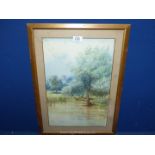 A framed and mounted watercolour of a River landscape and a church in the distance, glass a/f.