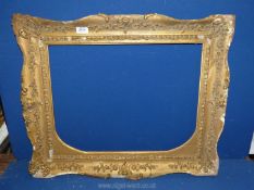 An ornate picture Frame (some damage to the plaster), 27½" x 22½" frame, aperture of 21¼" x 16¼".