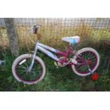 A child's Angel bike with stabilisers.