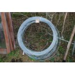 Two rolls of plain galvanised wire.