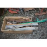 A wooden box of handsaws plus M12 threaded bar and galvanised strips, etc.