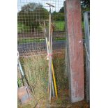 A selection of garden rakes.