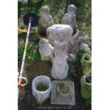 Two concrete bird baths and a quantity of ornaments.