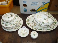 A quantity of Wedgwood Wild strawberry dinnerware including lidded serving dish (lid cracked),