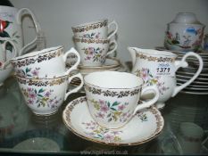A Royal Grafton part Teaset in floral pattern with foliage rims.