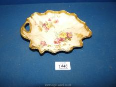A late Victorian Royal Worcester leaf form blush ivory dish well painted with flowers and finely