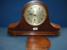 A Napoleon hat mantle Clock standing on ball feet, 22'' wide x 12 1/2'' high x 6'' deep,