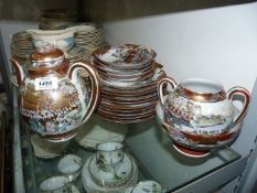 A quantity of oriental tea ware including plates, saucers, teapot, slop bowl etc., some damage.