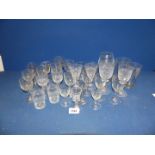 A quantity of early port and sherry glasses (mostly etched,) some with vines, ferns, etc,