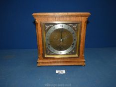 An eight day Mantle Clock with Westminster and Whittington chimes, with key,