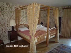 An elegant pair of contemporary Oak four poster 3' Single Beds with as new Hastens mattresses,