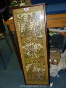 An eastern picture on fabric with scenes of figures, mythical beasts, birds and trees,