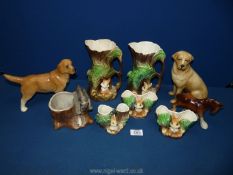 Five ceramic Hornsea pieces (vases), two ceramic dogs, ceramic horse and dog looking at rabbit vase.
