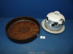 A Highland Studio pottery cheese dome and stand and a Denby shallow dish.