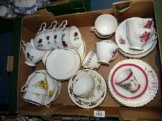 A quantity of part tea set, cups saucers,