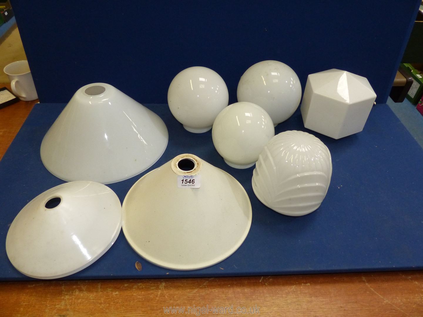 A quantity of white glass lampshades including coolie shape,