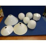 A quantity of white glass lampshades including coolie shape,