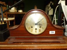 A wooden cased mantle clock with Westminster chimes, 16 1/2'' wide x 9 1/2'' tall x 7 1/2'' deep,