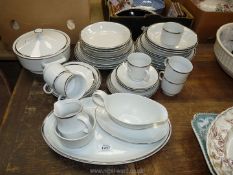 A quantity of Bohemia dinner and tea ware, white/silver rimmed and with some wear.