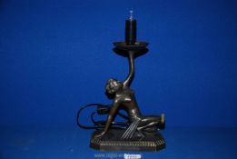 An Art Deco style nude woman metal lamp (no shade) 14" tall x 8" wide.