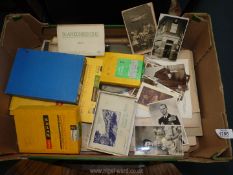 A quantity of old black and white photographs, ouija board, descant recorder, photographic paper,