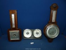 A banjo shaped Barometer and a square faced Barometer, plus a Metallic thermometer.