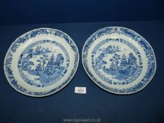 A pair of early 19th c Chinese blue and white hand painted dishes, 10" wide, a/f. (hairline cracks).