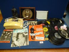 A quantity of miscellanea including 1960's pop magazines, 45 rpm records, framed butterflies,