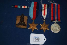 Three World War II Medals to include The War Medal,