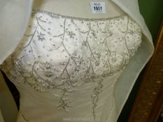 An ''Amanda Wyatt'' wedding Dress with beaded front panelling and zip/button back,