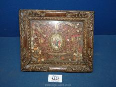 A scrolled paper shrine or reliquary, Italian or French c 1700,