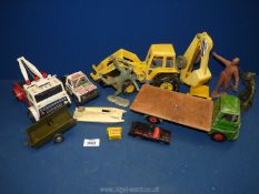 A quantity of toys including lorries, JCB, soldiers, etc.