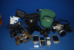 A small quantity of cameras and binoculars including a pair of military Heath and Co Ltd binoculars,