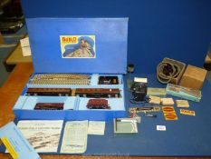 A Hornby Dublo OO train set (complete) along with a small quantity of Hornby Dublo accessories